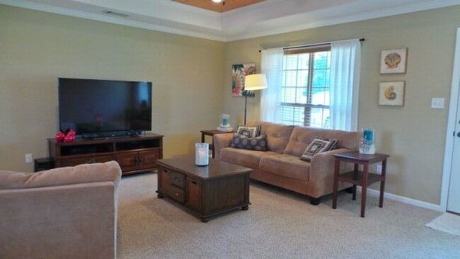 Building Photo - Modern Elegance Meets Spacious Comfort: 4B...