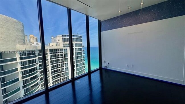 Building Photo - 17141 Collins Ave