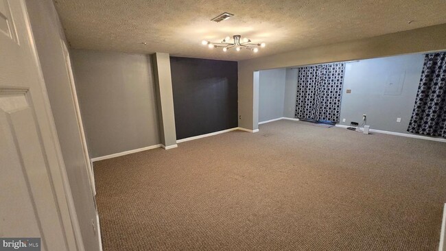 Building Photo - 6565 Ronald Rd