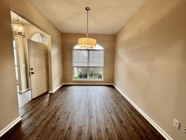 Building Photo - Behind the Gates: A Corner-Lot 4 bedroom, 2 bath Retreat in Coveted Pace Island!!