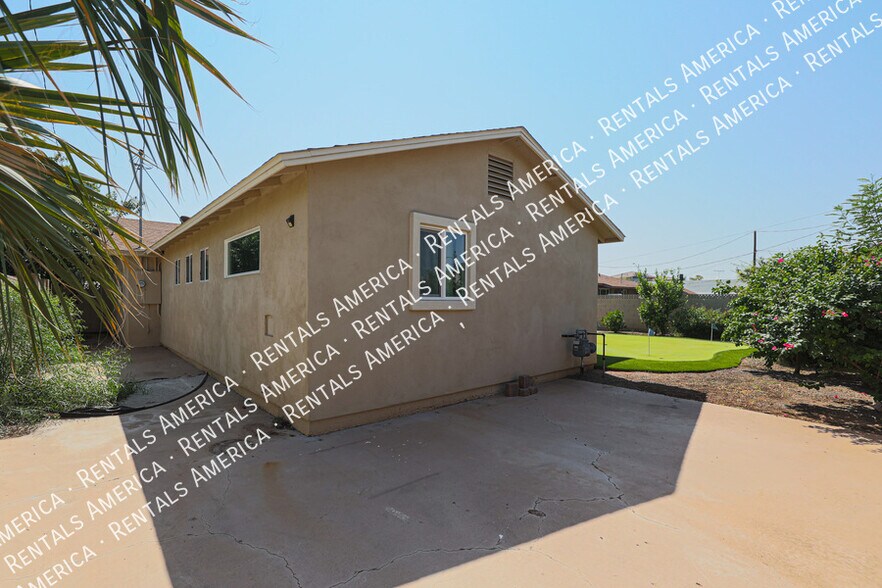 Building Photo - 8120 E Amelia Ave