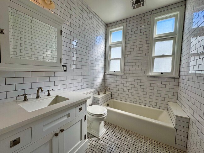 Building Photo - Gorgeous Remodeled Spanish 2+1.5 near the ...