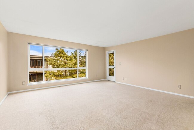 Building Photo - Waterfront Serenity: 1 Bedroom 1 Bathroom Luxury Living with Dock Access