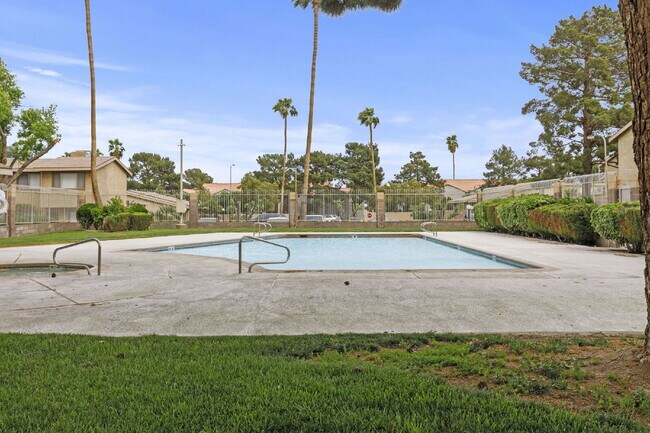 Building Photo - "Charming 3-Bedroom Townhouse Oasis with 2 Full Baths in Las Vegas – 1220 Sq Ft of Comfortable Li...