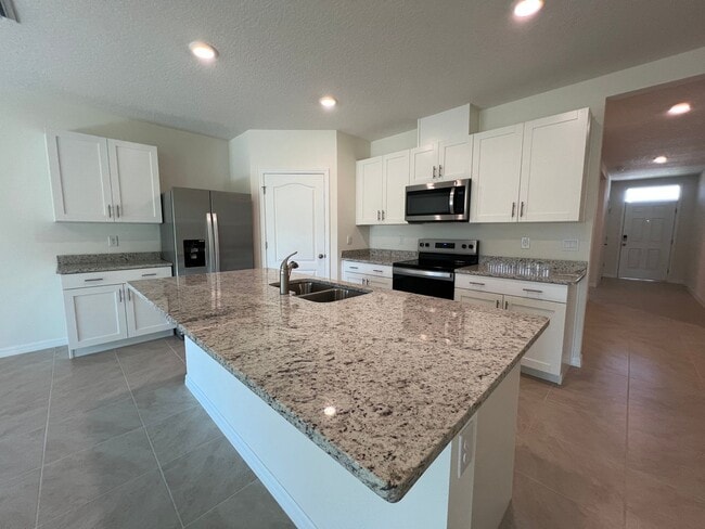 Building Photo - Brand New! 4 Bedroom, 2 Bathroom home in t...