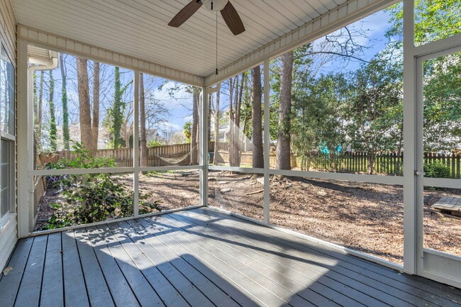 Building Photo - Beautifully Appointed 4BR Home Featuring a Screened Porch, Spacious Living Areas & Community Pool...