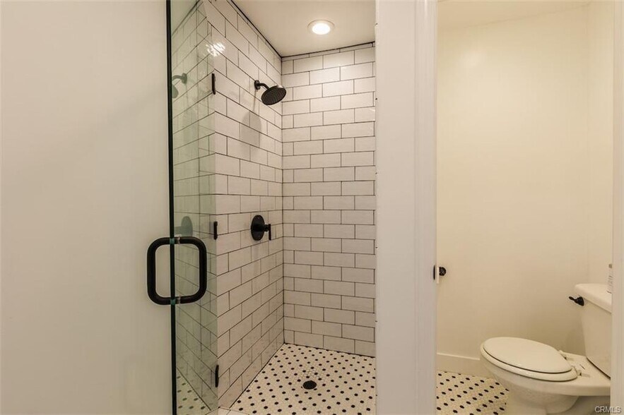 Custom tile shower - 18203 Coastline Dr