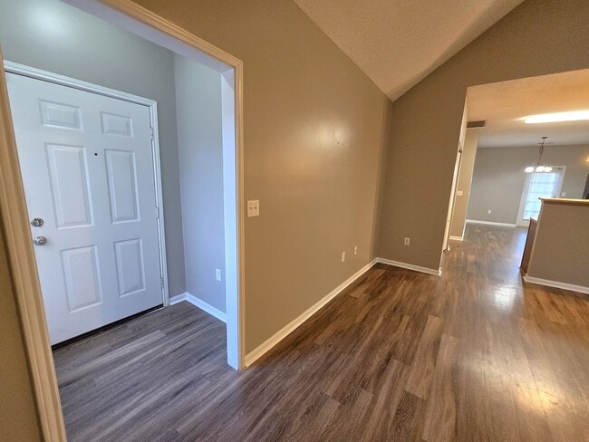 Building Photo - Rent INCLUDES water/sewer and yard maintenance.