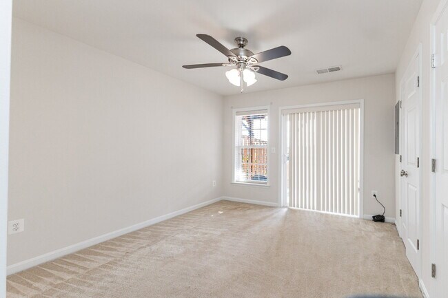 Building Photo - This beautiful townhouse has everything you need in a dream home.