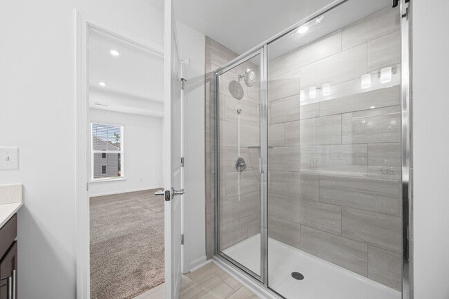 Building Photo - Spacious 3BR Townhome with Garage, Open Layout & Community Pool – Move-In Ready!