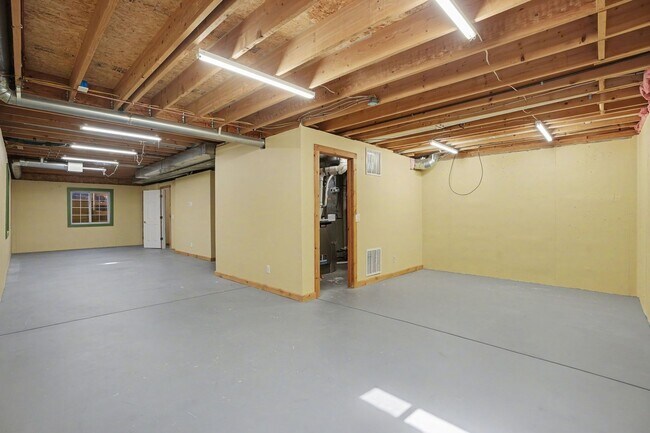 Building Photo - Backs to Open Space | Over 4,000 Sq Ft | Updated Kitchen + Solar