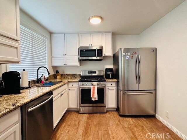 Building Photo - 950 W Lambert Road Unit 8