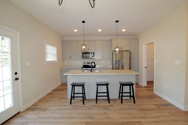 Building Photo - Spacious 4 Bedroom, 3.5 Bath Townhome with...