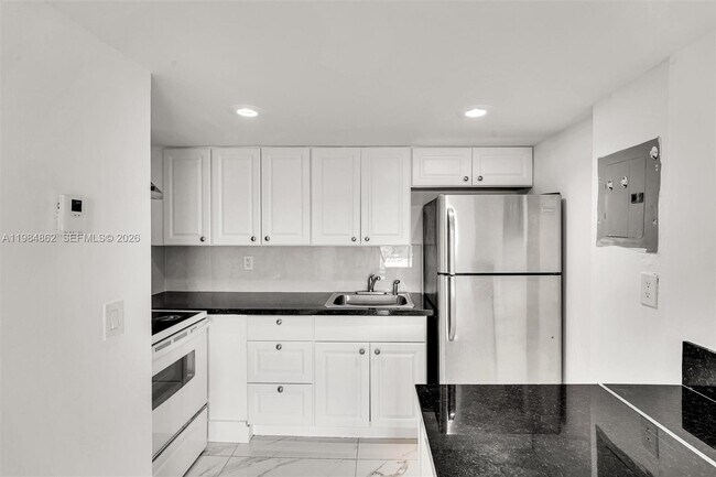 Building Photo - 4335 NW S Tamiami Canal Dr