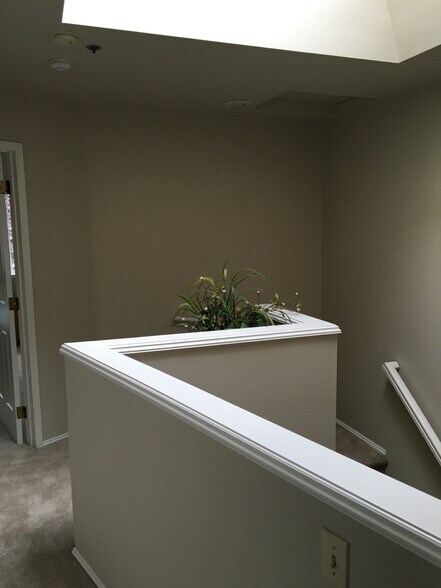 upstairs area by laundry nook with sky light beaming down. - 9915 NE 124th St