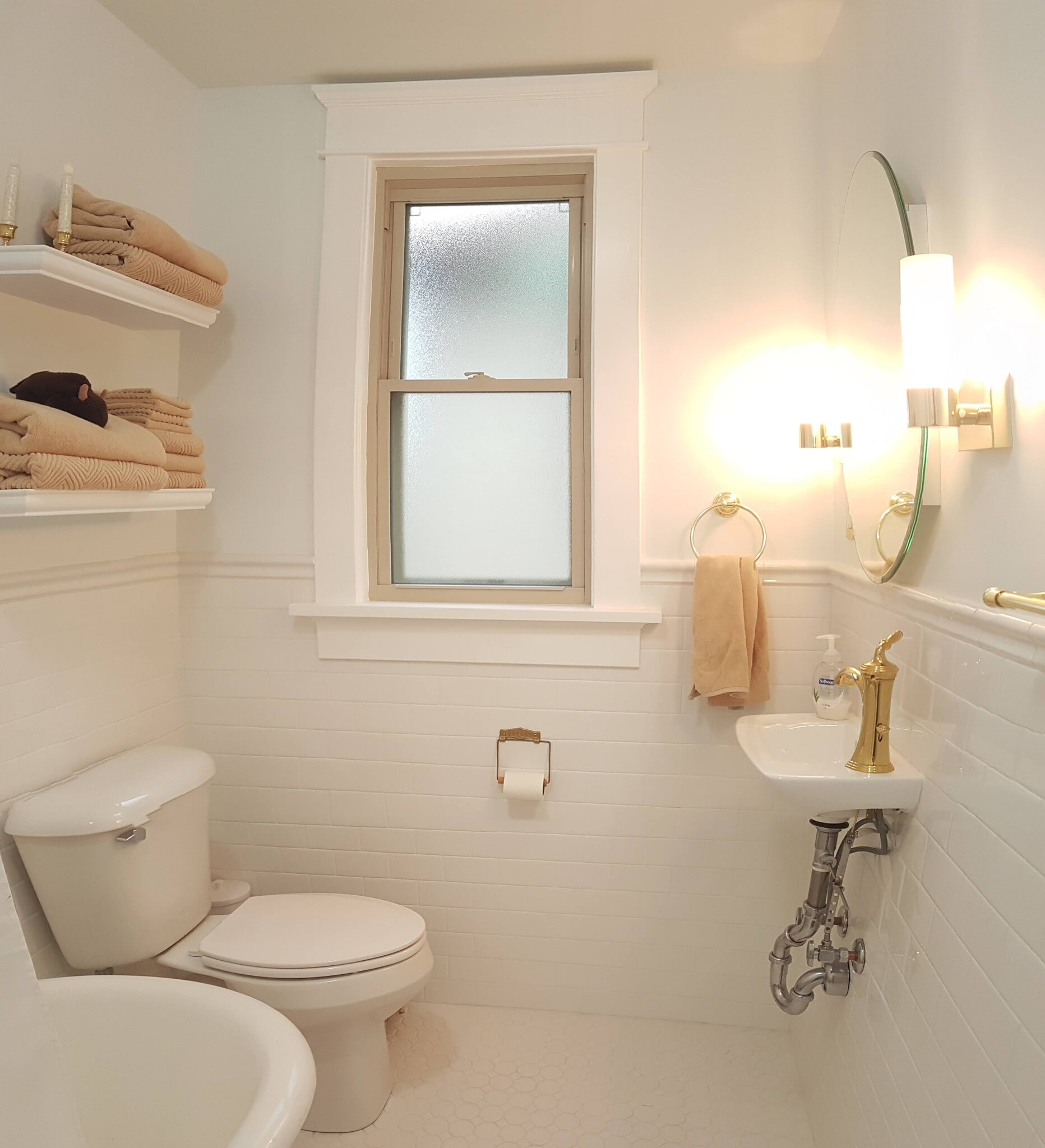 Full bath with original claw foot tub and in floor radiant heat - 407 S. 6th Street