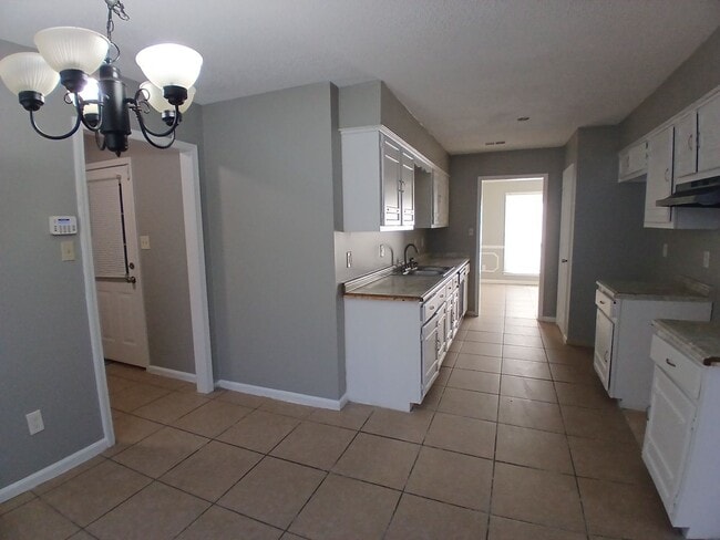 Building Photo - Blend of scale and sophistication in this expansive 3-bedroom, 2 bath residence - Open To Section 8