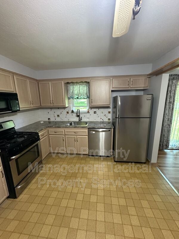 Building Photo - 6188 Cabrini Ln