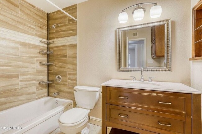 Building Photo - 8640 E Wilshire Dr