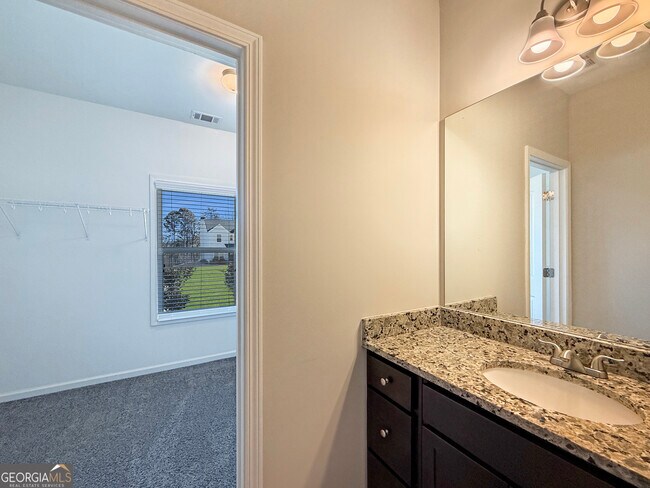 Building Photo - 6369 Woodland Station Dr