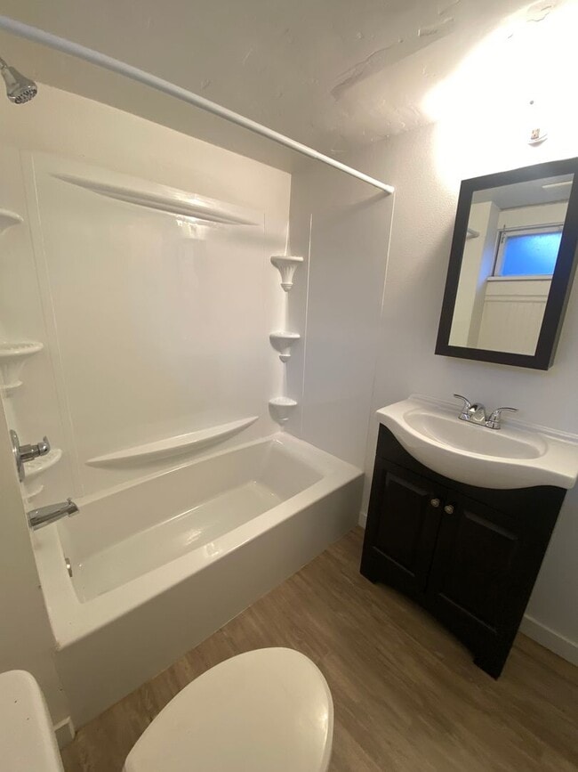 Building Photo - Charming Studio with Shared Patio and Coin-Op Laundry