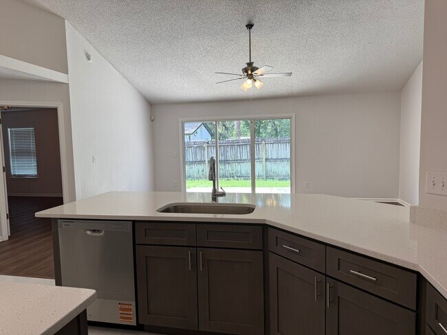 Building Photo - 5458 Hidden Gardens Dr