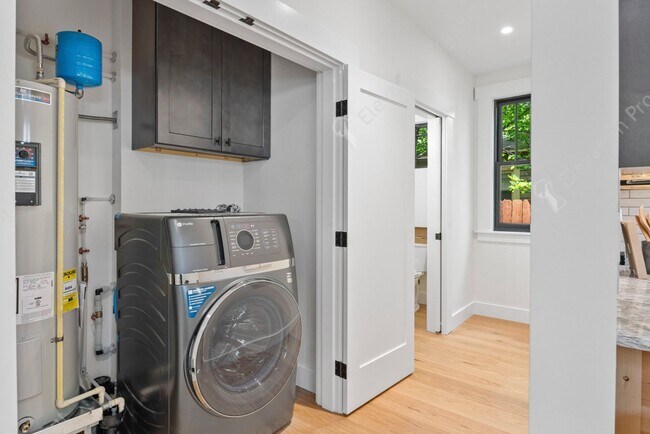 Building Photo - Experience Sustainable Luxury in this Prem...