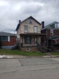 Building Photo - Inviting 2-Bedroom Home with Spacious Livi...