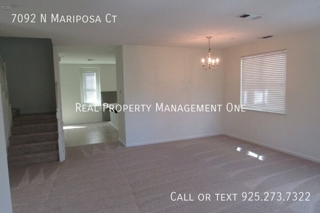 Building Photo - 7092 N Mariposa Ct