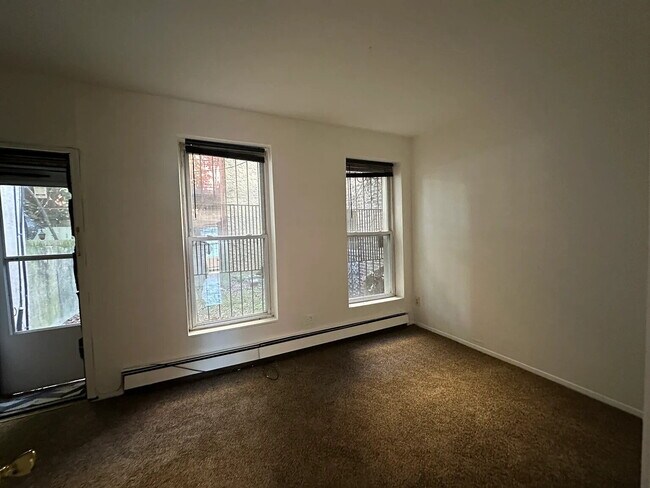 Building Photo - "Chic Urban Oasis: Cozy 1-Bedroom Apartment in Vibrant Brooklyn Locale!"