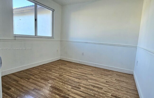 Building Photo - 8575 SW 152nd Ave