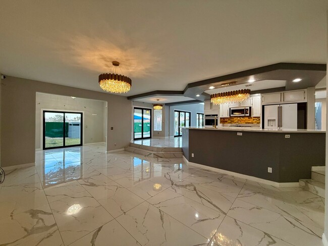 Building Photo - 5/BD 3/BA Modern Luxury Living with Pool, ...