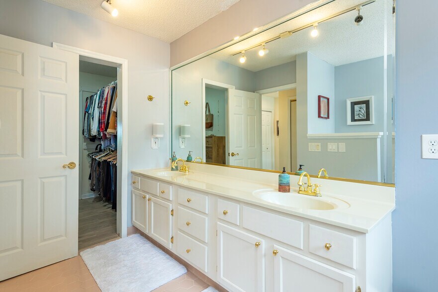 Upper level spacious vanity with ample counter space and clean design. - 405 Windswept Dr