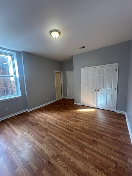 Bedroom 1 includes a large window that brings great lit. - 1426 Madison Ave