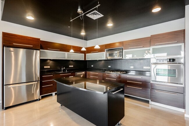 Building Photo - Modern Industrial Loft at Soho Lofts – 1BR/2BA High-Rise in the Arts District, City & Mountain Vi...