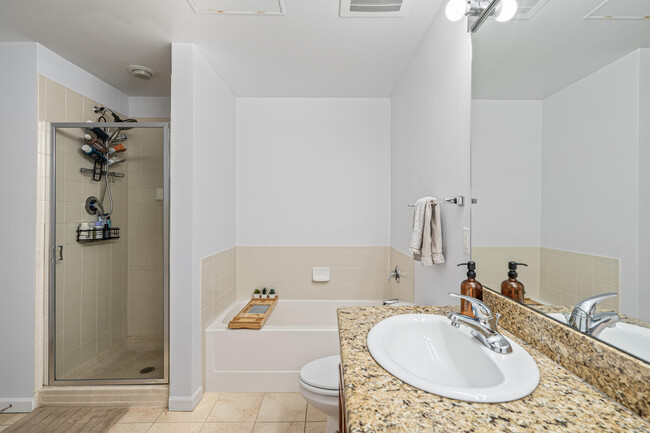 Bathroom with tub and standing shower - 1950 N Logan St