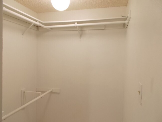 Building Photo - Two-story, 2-bedroom townhome ideally located in the heart of Boulder City