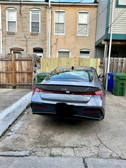 Parking pad - 128 N Belnord Ave