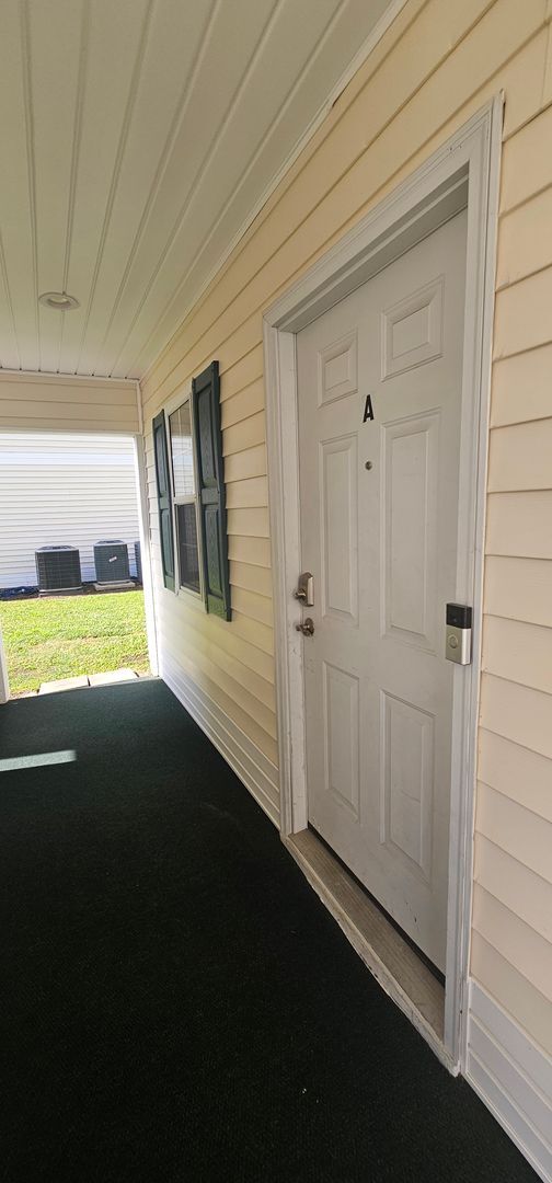 Building Photo - -First-Floor End-Unit | Fully Furnished 2B...