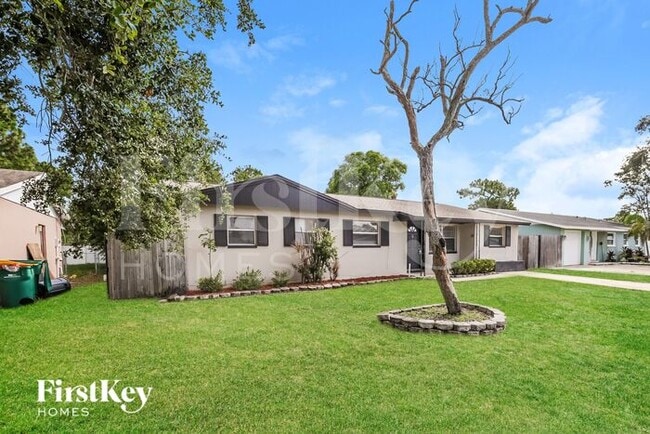 Building Photo - 8275 Jacaranda Ave