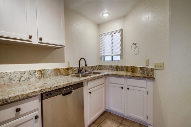 Building Photo - Spacious Townhome in San Marcos, 2-Car Garage, and a Tropical Community Pool!!