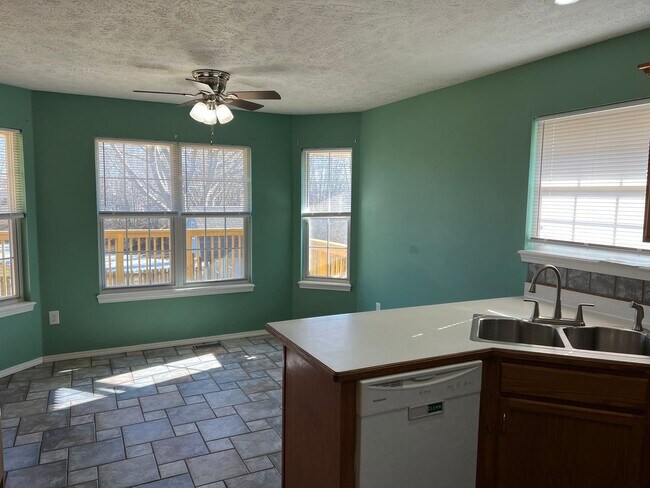 Building Photo - Now Available! Gorgeous Walkout Basement Home with a Pool, Ozark