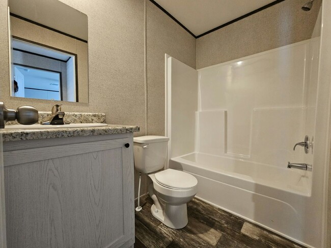 Building Photo - 6701 Hidden Oaks Dr