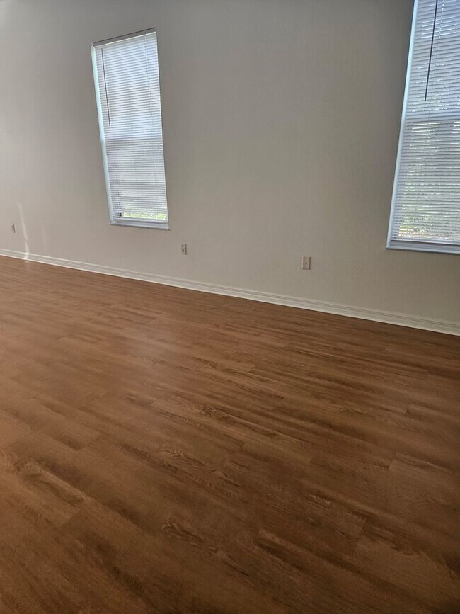 Building Photo - 4 BEDROOM 3 FULL BATH HOME WITH A SCREENED IN POOL IN THE BEAUTIFUL PALM COAST