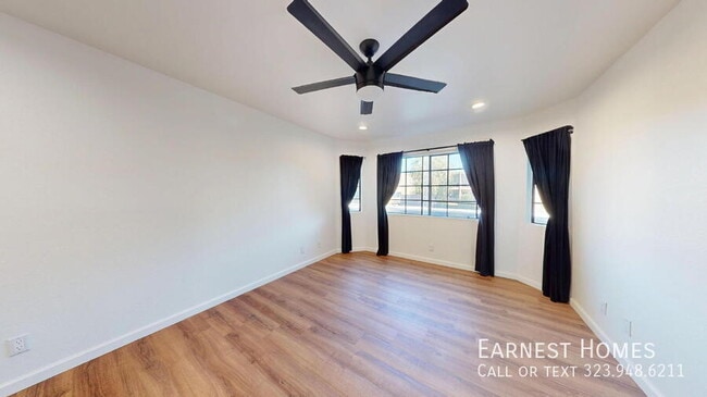 Building Photo - 10220 De Soto Ave