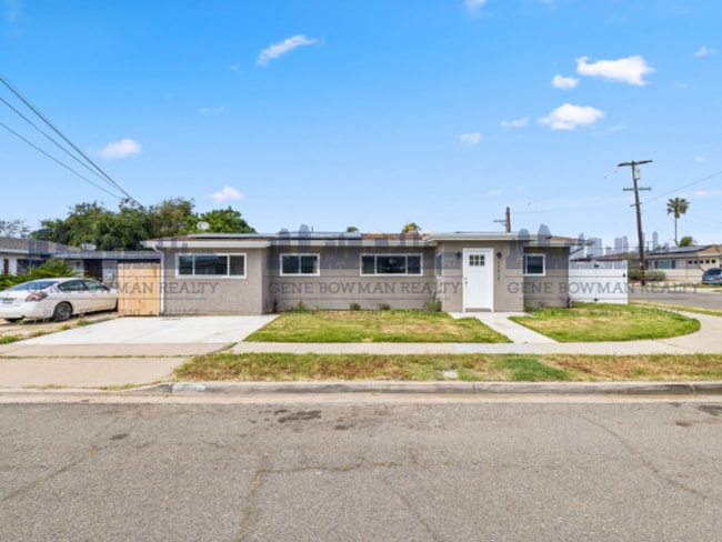 Primary Photo - Charming 4-Bedroom Corner Lot Home with Pr...