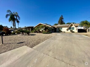 Building Photo - Coming Soon! Spacious 4-Bed, 2-Bath Countr...