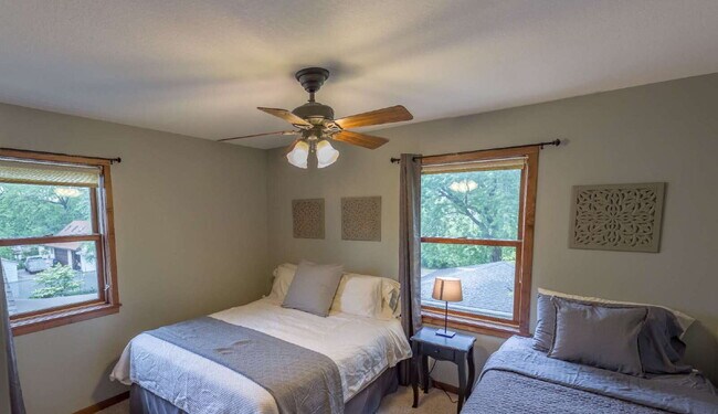 Building Photo - Spacious 5-Bedroom Minneapolis Gem with Gas Fireplace & Finished Basement