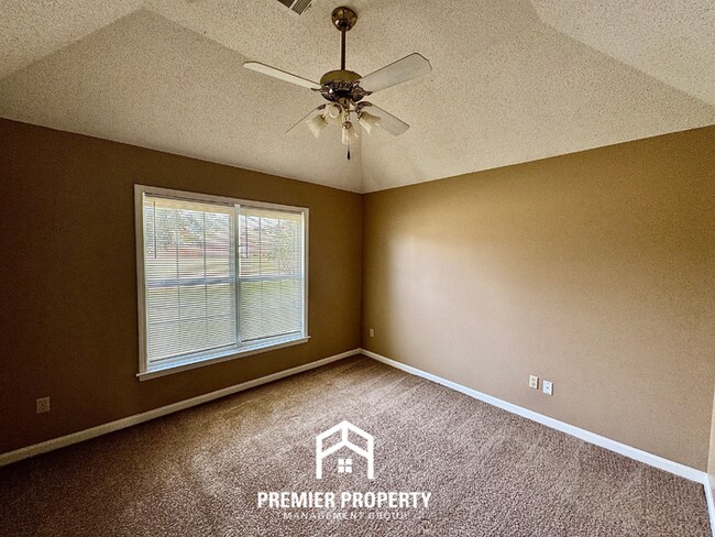 Building Photo - Spacious 3BR/2BA Near Southwind | 1,958 Sq Ft, Brick Fireplace, 2-Car Garage & Quiet Cove