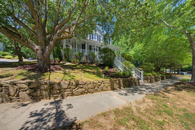 Building Photo - Southern Charm Meets Everyday Entertainment and Convenience!